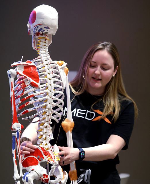 Prospective students learn about OMM at Med-Xtravaganza.