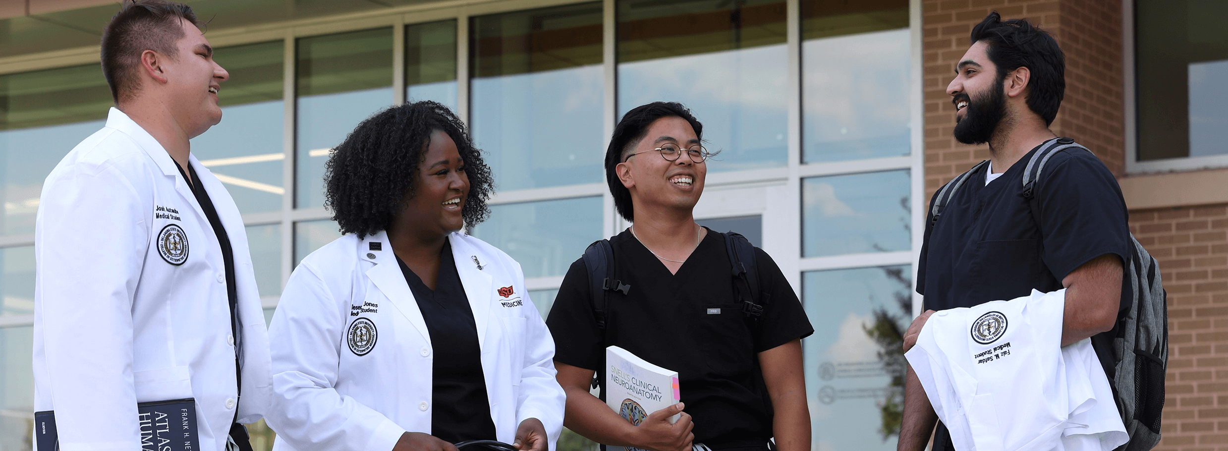 Medical students walking together on campus.