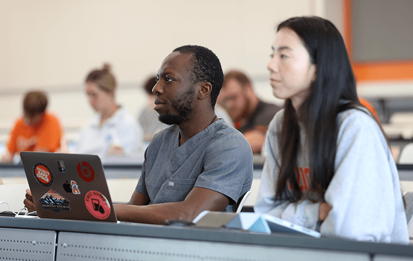 Students listen as Kelly Rudd lectures at the OSU Center for Health Sciences in Tulsa, Oklahoma.