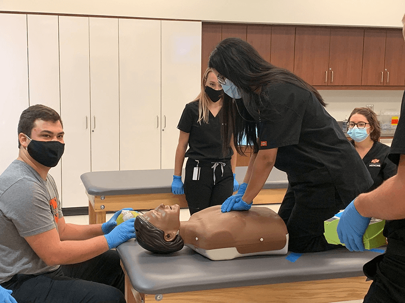 OSU-COM students in Tulsa tackle Basic Life Support Training.