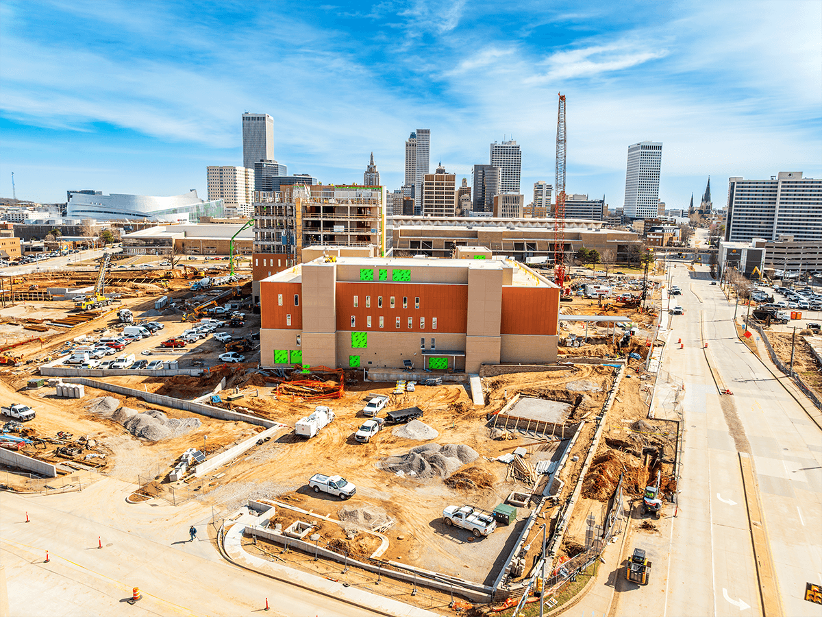 Aerial view of many trucks and construction materials on the Veterans Hospital construction site.