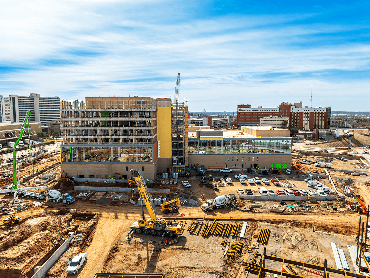 Cranes, cement trucks and steel beams on the Veterans Hospital construction site.